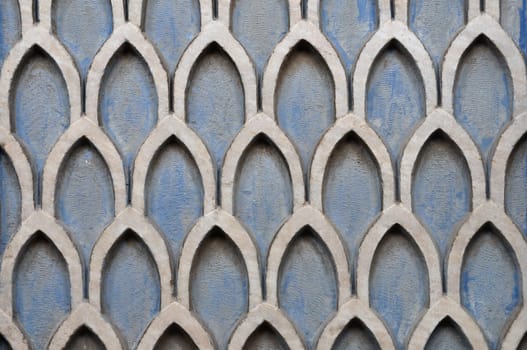Old textured wall with geometric pattern abstract background.