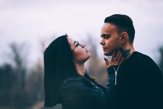 man and woman near the river autumn.
