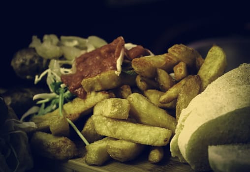 Potato chips with cheese and tomato, healthy and fast food