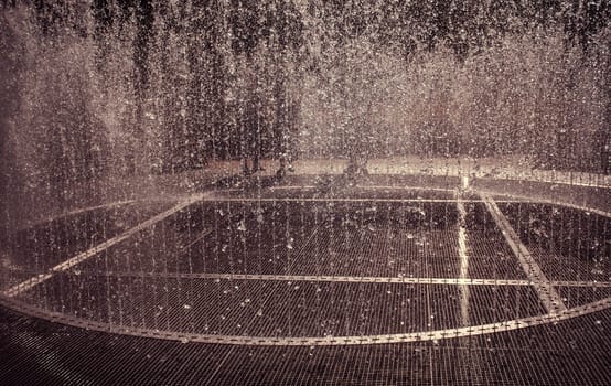 Water fountain with people, party and show