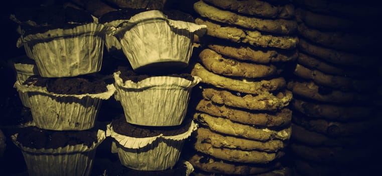 Cookies and chocolate muffins in pastry, desserts and sweets