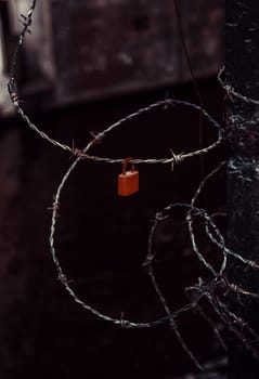 Padlock hanging on bridge, symbol of love, union