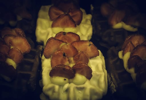 Strawberries with chocolate in pastry, desserts and sweets