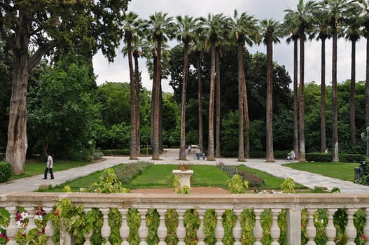 ATHENS, GREECE - JUNE 9, 2014: People walking on the National Garden public park in central Athens, Greece.