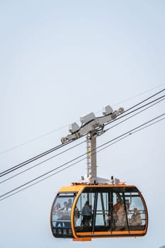 Dubrovnik, Croatia - April 2018 : Dubrovnik cable car, a popular tourist attraction taking people on the top of a Mount Srd above the historical Old Town Walls