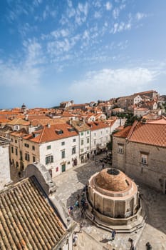Dubrovnik, Croatia - April 2018 : The famous Dubrovnik Stradun street Onofrio Fountain in the Old Town, seen from above