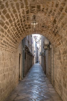 Dubrovnik, Croatia - April 2018 : Archway narrow street passage in the Dubrovnik Old Town
