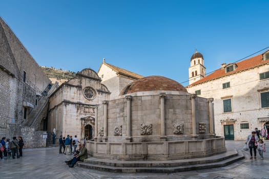 Dubrovnik, Croatia - April 2018 : The famous Dubrovnik Stradun street Onofrio Fountain in the Old Town