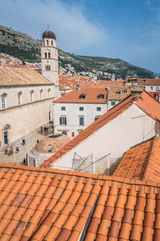 Dubrovnik, Croatia - April 2018 : Church bell tower and rooftops of old houses in Dubrovnik, viewed from the Old Town fortified walls