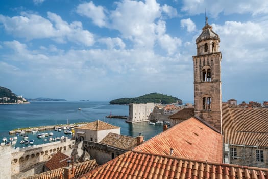 Dubrovnik, Croatia - April 2018 : Church bell tower and rooftops of old houses in Dubrovnik, viewed from the Old Town fortified walls