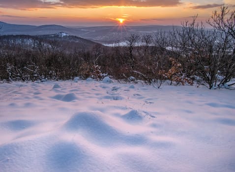 Hills covered by snow in winter
