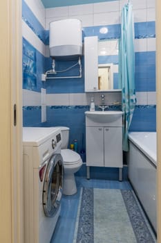 Entrance to a small bathroom with toilet