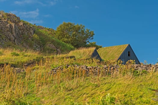 Stone Fence and Grassy Roofs in the Countryside near Borgarnes, Iceland