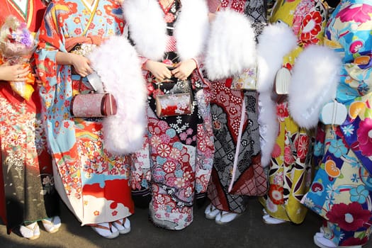 KAGAWA, JAPAN - JANUARY 13, 2019: Young Japanese women wearing traditional kimono for the coming of age day celebration, they turn twenty (seijinsiki, seijinshiki) in Kagawa, Japan.