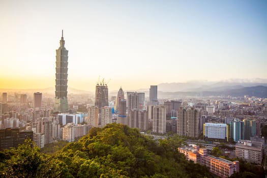 TAIPEI , TAIWAN - DEC 24, 2017 : The scene of Taipei 101 building and Taipei city Taiwan on December 14 2017. The photo has been taken from the top of Elephant Mountain, Taipei