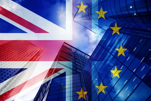 brexit concept - UK economy after Brexit deal - double exposure of flag and Canary Wharf business center skyscrapers