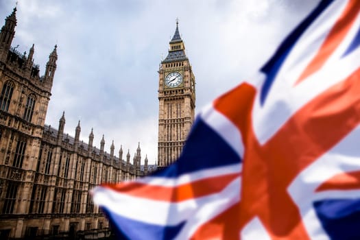 brexit concept - double exposure of flag and Westminster Palace with Big Ben