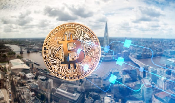 bitcoin against skyscrapers - futuristic smart city - cryptocurrency concept