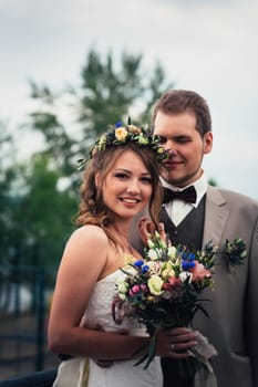 Young bride and groom in the style of provence.