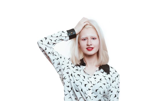 portrait blonde albino girl in studio on white background.