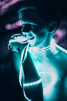 Portrait man Strip Light LED tape on dark color background.