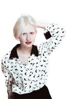 portrait of blonde albino girl in studio.