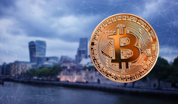 bitcoin against skyscrapers - futuristic smart city - cryptocurrency concept
