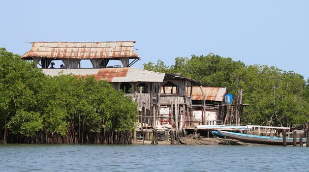 Huts of fishermen in the Gambia, made of wood