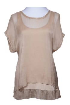 Summer blouse. A elegant female beige summer blouse on mannequin isolated on a white background. Women summer fashion.