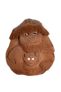 Monkey isolated. Funny monkey mother with a child was carved out of a coconut shell and isolated on a white background. Hand made souvenir from Thailand.
