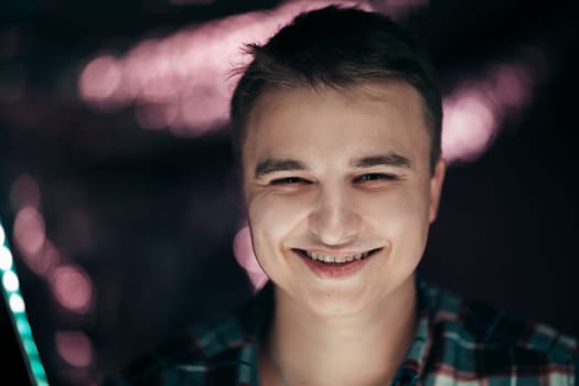 portrait of a young man on a blurred background.