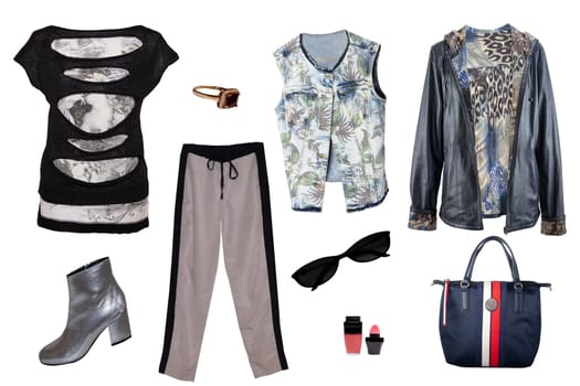Collage woman clothes. Set of stylish and trendy women dresses, pants, denim vest, jackets, handbag and accessories isolated on a white background. Latest fashion trends.