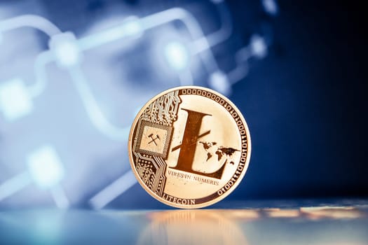 litecoin on blue chart background cryptocurrency concept