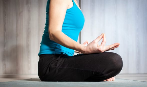 woman doing yoga at home