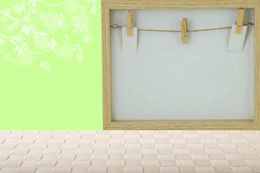 Table top on empty wooden frame. Empty wooden frame on bright wooden table and a abstract light green spring backround with flowers. Template for your design.