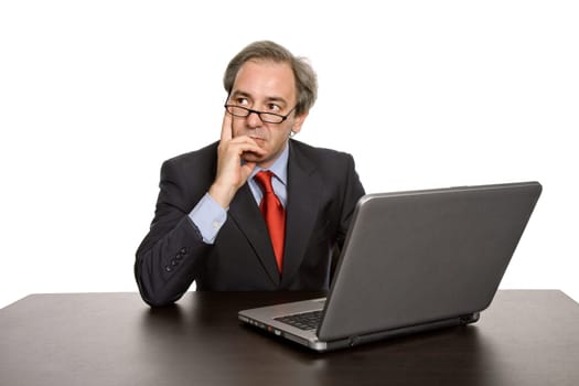 mature business man working with his laptop