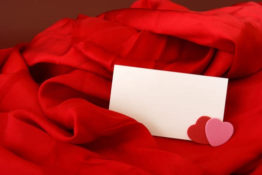 A blank notecard placed within a romantic scene.