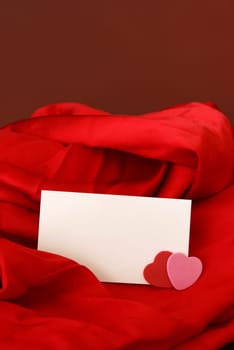 A blank notecard placed within a romantic scene.