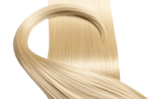 Closeup on luxurious straight glossy blonde hair