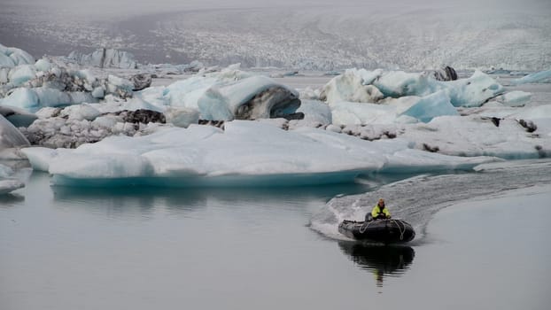 JOKULSARLON - OCTOBER 18: Motor boat on the icy water in Jokulsarlon lagoon in Iceland October 18, 2016.