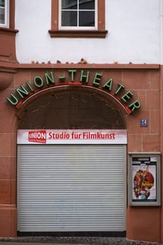 Kaiserslautern, Germany - January 26, 2019: Lowered blinds at the closed entrance of the Union Theater, the studio for film art on January 26, 2019 in Kaiserslautern....