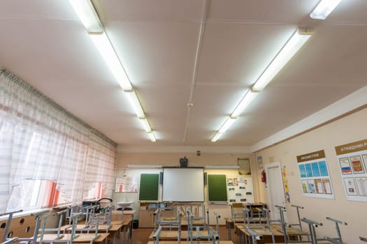 Anapa, Russia - January 26, 2019: Artificial lighting at school, fluorescent lamps