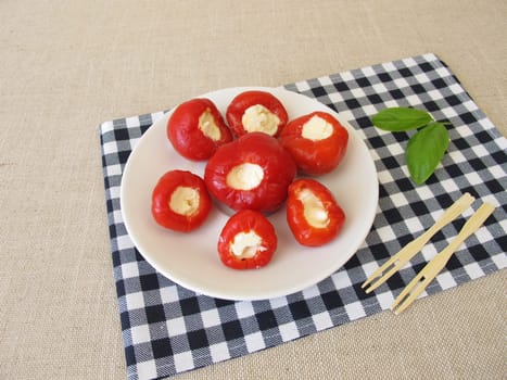 Red cherry pepper stuffed with fresh cheese