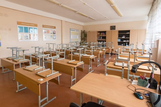 Anapa, Russia - January 26, 2019: Vacations at school, in the classroom inverted chairs are on the desks