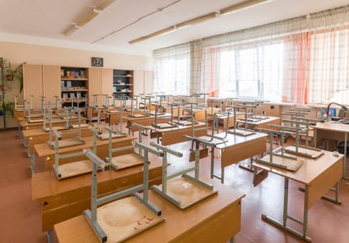 Anapa, Russia - January 26, 2019: Vacations at school, in the classroom inverted chairs are on the desks