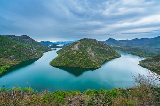 The hill called the Green Pyramid and the bend of the Rijeka Crnojevica River, Skadar Lake National Park, Montenegro