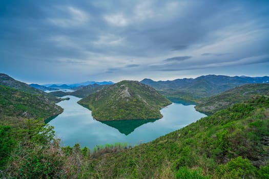 The hill called the Green Pyramid and the bend of the Rijeka Crnojevica River, Skadar Lake National Park, Montenegro
