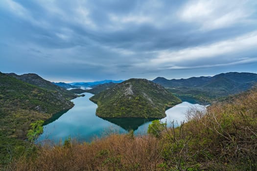 The hill called the Green Pyramid and the bend of the Rijeka Crnojevica River, Skadar Lake National Park, Montenegro