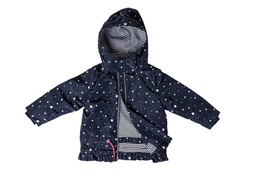 Kids jacket isolated. A stylish fashionable dark blue jacket with white dots and blue white striped lining for the little girl. A rain coat and windbreaker with hood for spring and autumn.