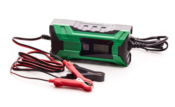 Smart multi purpose battery charger. Car battery charger isolated on a white background. Concept of service, maintenance, charging car battery, diy